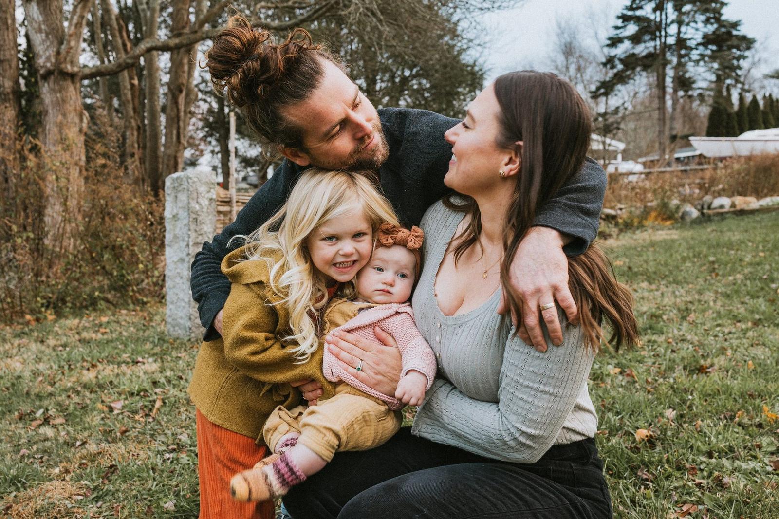 Thaler Hefel with his wife and two young daughters